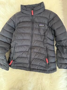 Patagonia puffer jacket in navy with multicolor logo